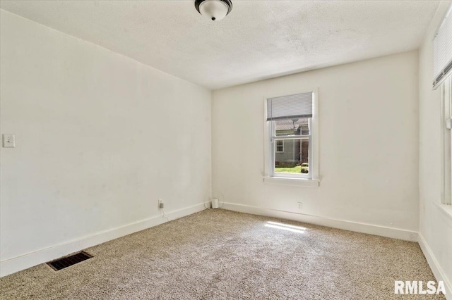 1310 Ledlie Ave, Springfield, IL 62702 - unfurnished room featuring carpet floors and a textured ceiling