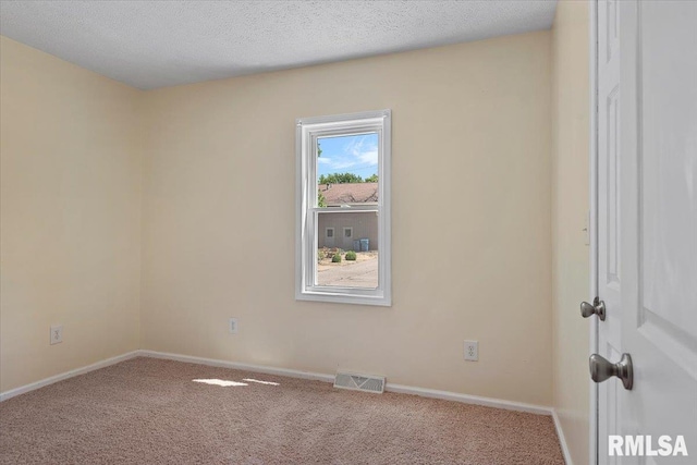 3132 S 4th St, Springfield, IL 62703 - unfurnished room featuring carpet floors and a textured ceiling