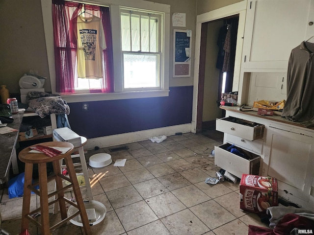 426 N Hamilton St, Lincoln, IL 62656 - dining area featuring light tile patterned flooring