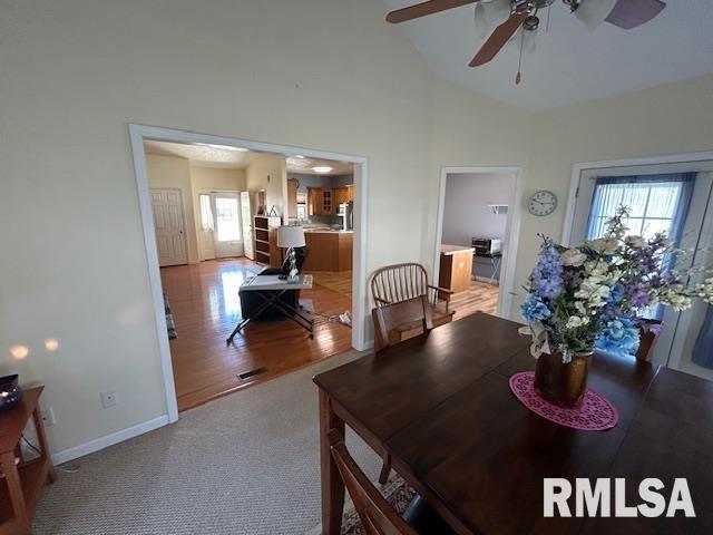 4424 Venetian Dr, Springfield, IL 62703 - dining space with ceiling fan and vaulted ceiling