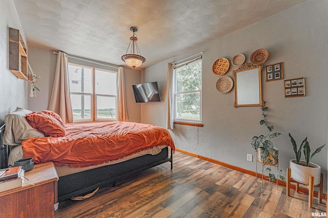 209 N 2nd St N, Easton, IL 62633 - bedroom with wood finished floors and baseboards