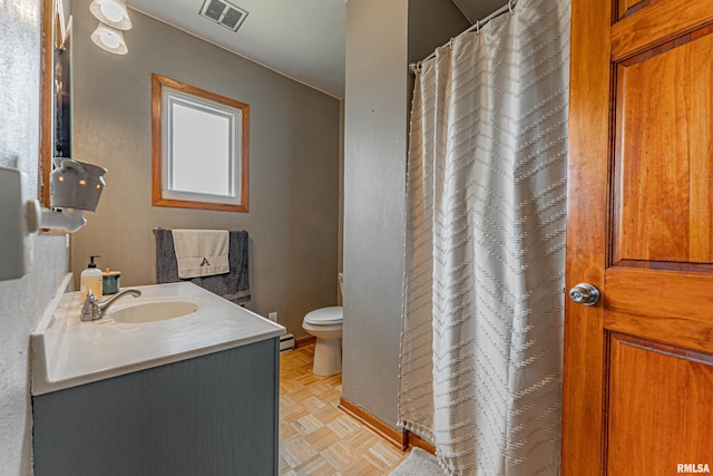 209 N 2nd St N, Easton, IL 62633 - bathroom with vanity, a shower with curtain, and a baseboard heating unit