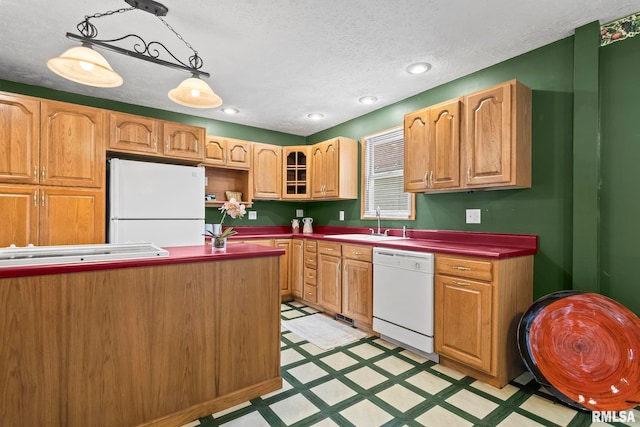 321 N 5th St, Petersburg, IL 62675 - kitchen with white appliances, light floors, decorative light fixtures, a textured ceiling, and glass insert cabinets