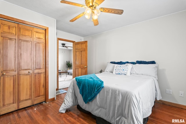 321 N 5th St, Petersburg, IL 62675 - bedroom with dark wood-style flooring and ceiling fan