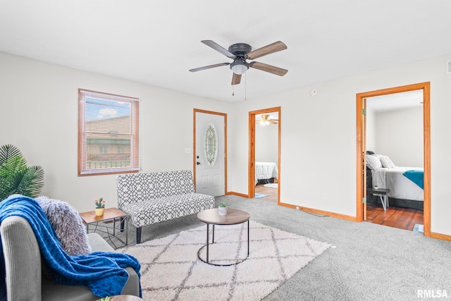 321 N 5th St, Petersburg, IL 62675 - living area with carpet floors and ceiling fan