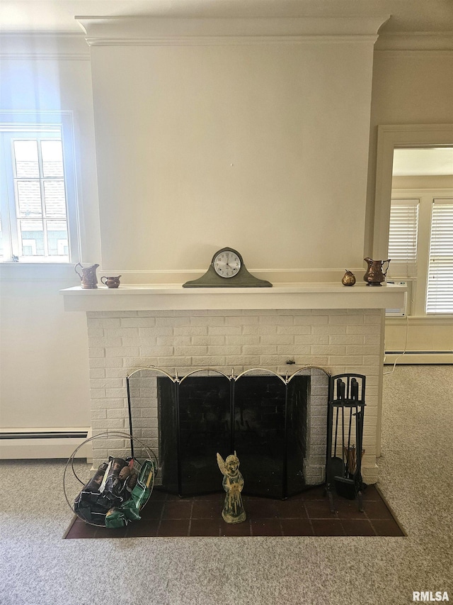 1155 N Cherry St, Galesburg, IL 61401 - detailed view of crown molding, a brick fireplace, carpet flooring, and a baseboard radiator