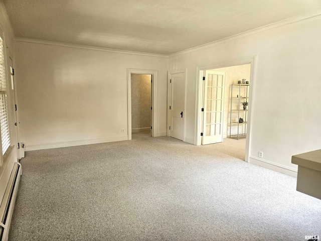 1155 N Cherry St, Galesburg, IL 61401 - empty room with baseboard heating, crown molding, and carpet floors