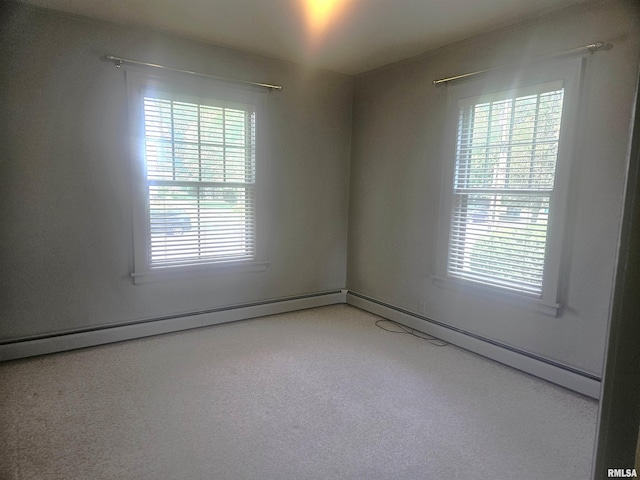 1155 N Cherry St, Galesburg, IL 61401 - carpeted empty room featuring a baseboard radiator