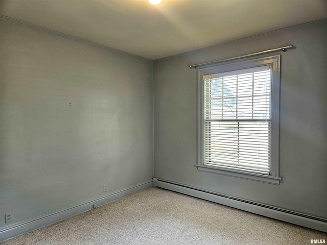 1155 N Cherry St, Galesburg, IL 61401 - empty room featuring a baseboard heating unit and carpet