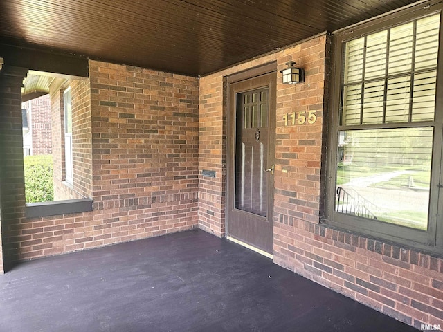 1155 N Cherry St, Galesburg, IL 61401 - view of exterior entry featuring brick siding