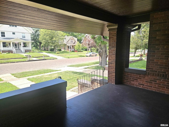 1155 N Cherry St, Galesburg, IL 61401 - covered porch featuring a lawn