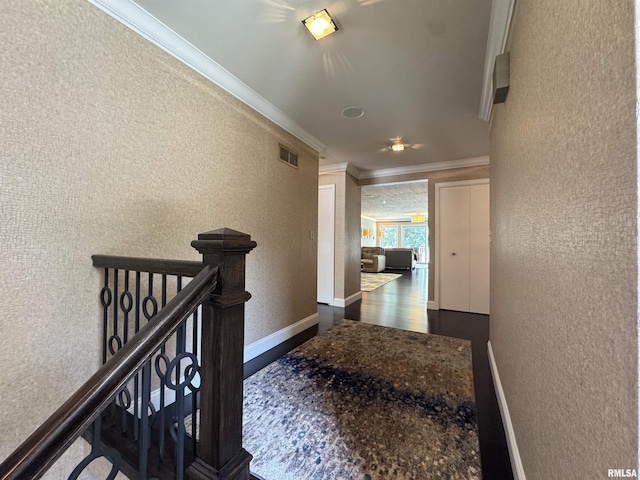 6 Ottawa Trl, Galesburg, IL 61401 - hallway with crown molding, a textured wall, wood finished floors, and an upstairs landing