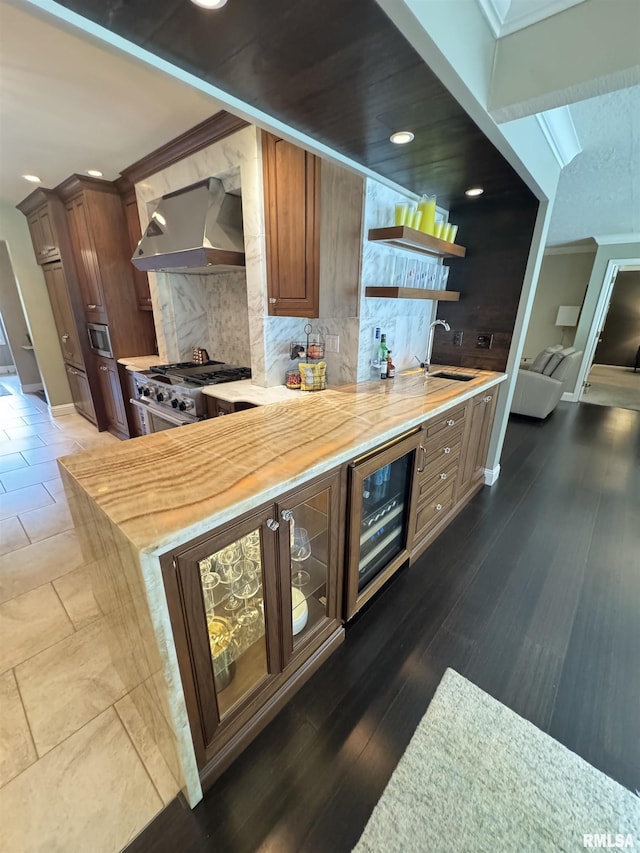 6 Ottawa Trl, Galesburg, IL 61401 - indoor wet bar with beverage cooler, ventilation hood, high end range, tasteful backsplash, and recessed lighting