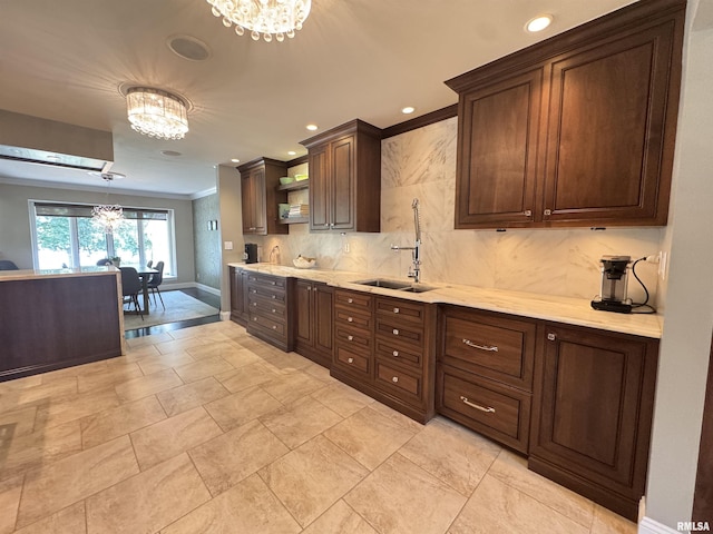 6 Ottawa Trl, Galesburg, IL 61401 - kitchen with a chandelier, backsplash, open shelves, dark brown cabinets, and recessed lighting