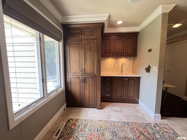 6 Ottawa Trl, Galesburg, IL 61401 - bar area with ornamental molding, backsplash, light tile patterned flooring, and recessed lighting