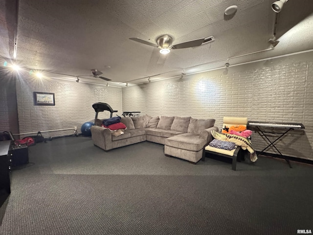 6 Ottawa Trl, Galesburg, IL 61401 - living area with carpet floors, ceiling fan, and a textured ceiling