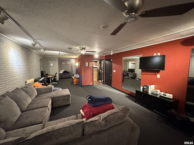 6 Ottawa Trl, Galesburg, IL 61401 - living room with a ceiling fan, a textured ceiling, and carpet floors