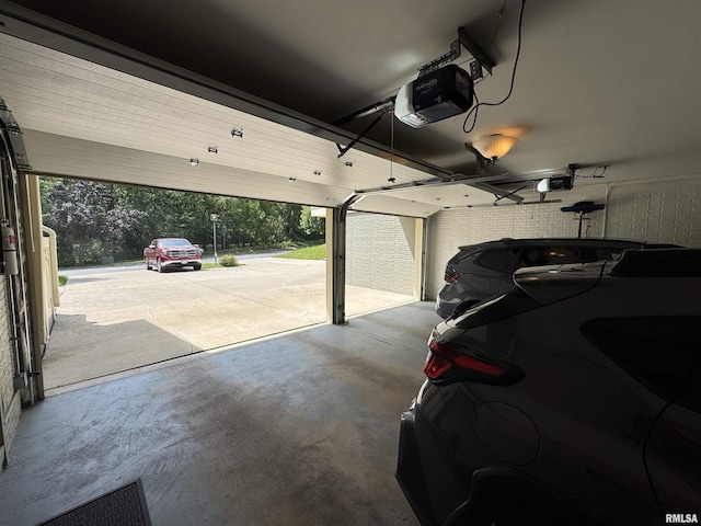 6 Ottawa Trl, Galesburg, IL 61401 - garage featuring a garage door opener
