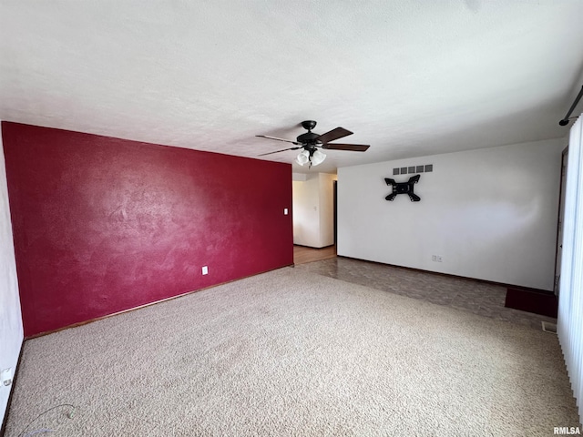 1275 Sunview Dr, Canton, IL 61520 - empty room featuring a ceiling fan and carpet floors
