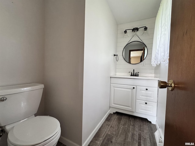 1275 Sunview Dr, Canton, IL 61520 - bathroom featuring vanity and wood finished floors