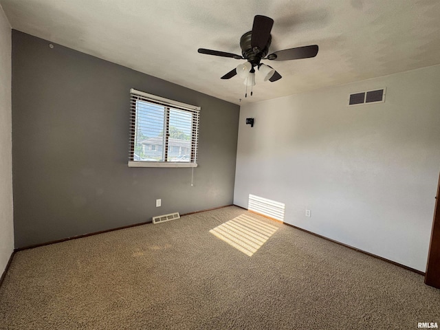 1275 Sunview Dr, Canton, IL 61520 - spare room featuring carpet and ceiling fan