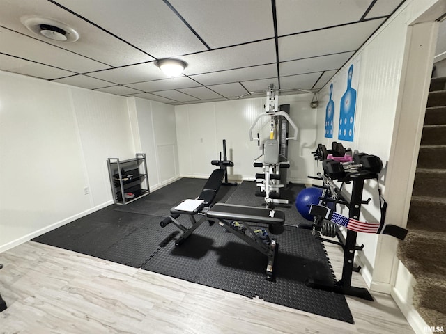 1275 Sunview Dr, Canton, IL 61520 - exercise area with wood finished floors and a drop ceiling