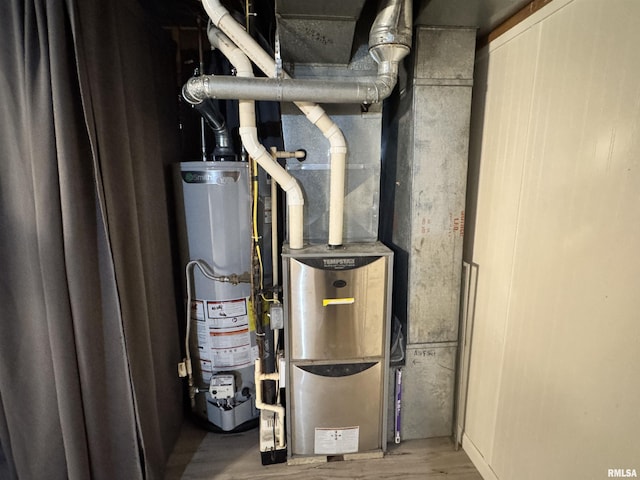 1275 Sunview Dr, Canton, IL 61520 - utility room featuring water heater