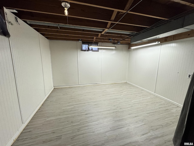 1275 Sunview Dr, Canton, IL 61520 - finished basement featuring wood finished floors and a decorative wall
