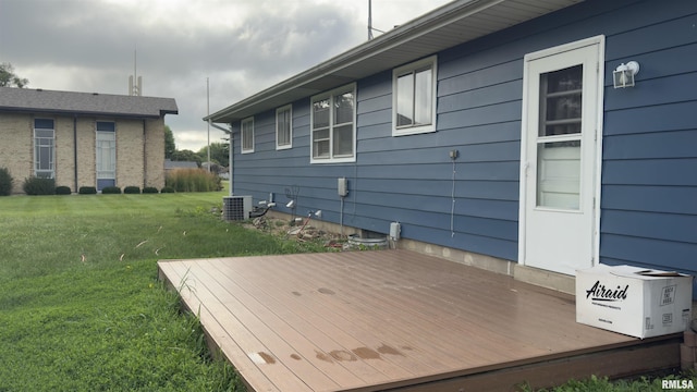 1275 Sunview Dr, Canton, IL 61520 - wooden deck featuring a lawn
