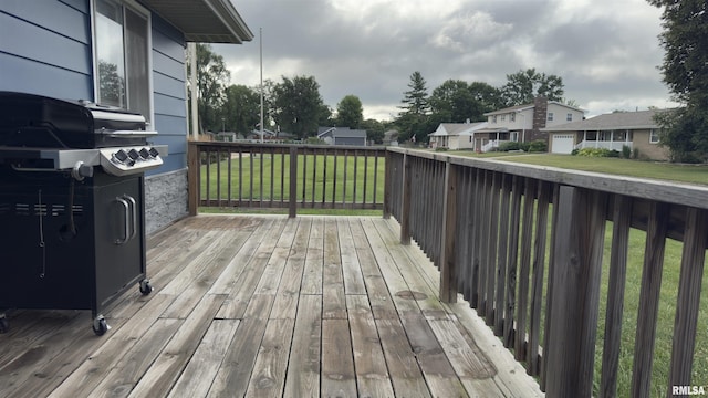1275 Sunview Dr, Canton, IL 61520 - wooden deck featuring a lawn, a grill, and a residential view