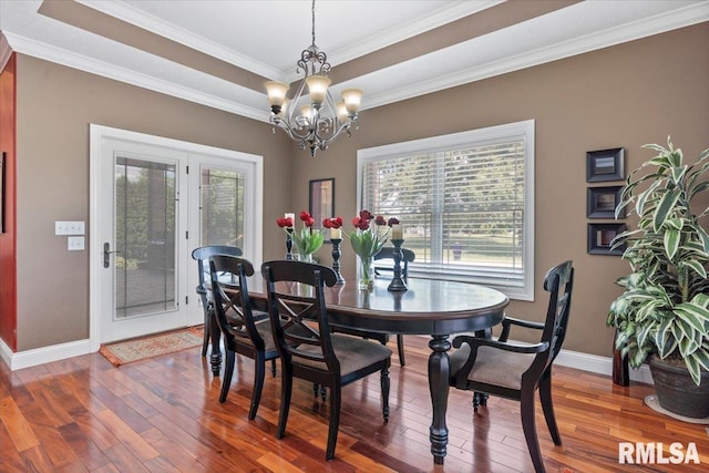 4408 Foxhall Ln, Springfield, IL 62711 - dining area featuring hardwood / wood-style flooring, a chandelier, crown molding, french doors, and a raised ceiling