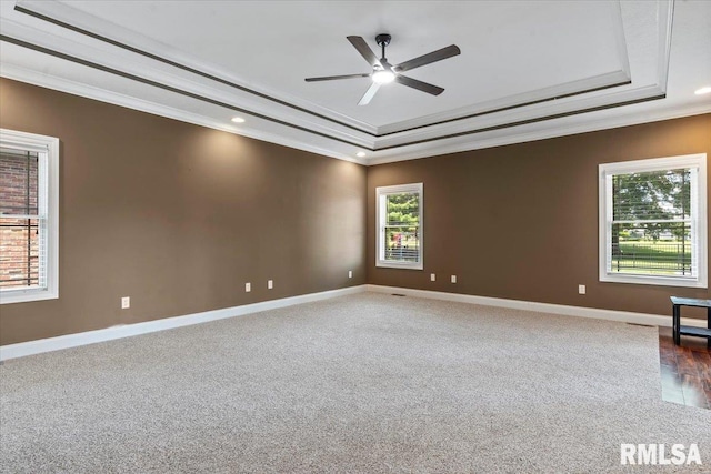 4408 Foxhall Ln, Springfield, IL 62711 - spare room with ornamental molding, a tray ceiling, ceiling fan, dark carpet, and recessed lighting