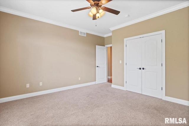 4408 Foxhall Ln, Springfield, IL 62711 - unfurnished bedroom with crown molding, carpet, a closet, and a ceiling fan
