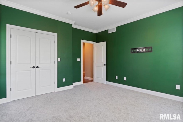 4408 Foxhall Ln, Springfield, IL 62711 - unfurnished bedroom with carpet flooring, crown molding, a closet, and ceiling fan