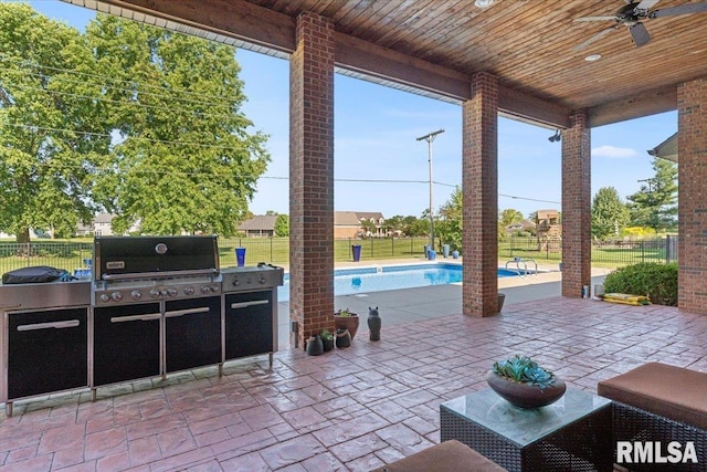 4408 Foxhall Ln, Springfield, IL 62711 - fenced backyard featuring area for grilling, a ceiling fan, and a patio area