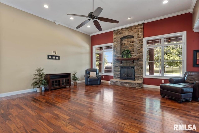 4408 Foxhall Ln, Springfield, IL 62711 - living area featuring a stone fireplace, crown molding, hardwood / wood-style flooring, a ceiling fan, and recessed lighting