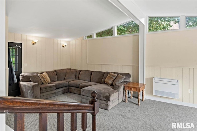 14 Beachview Ln, Springfield, IL 62712 - living area featuring carpet, heating unit, wooden walls, vaulted ceiling, and healthy amount of natural light