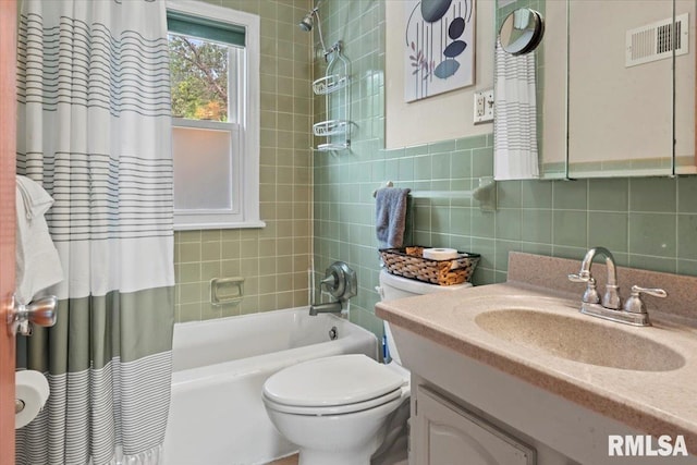 14 Beachview Ln, Springfield, IL 62712 - full bathroom with shower / bathtub combination with curtain, vanity, tile walls, and tasteful backsplash