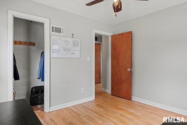 14 Beachview Ln, Springfield, IL 62712 - unfurnished bedroom with light wood-style floors and ceiling fan