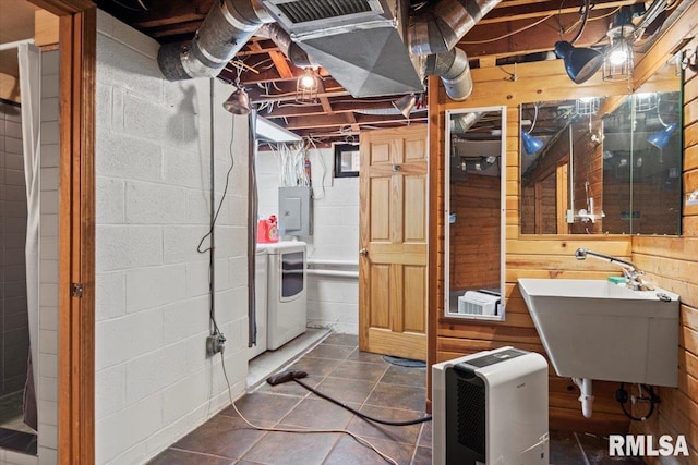 14 Beachview Ln, Springfield, IL 62712 - unfinished below grade area featuring washer / dryer, concrete block wall, electric panel, and wood walls