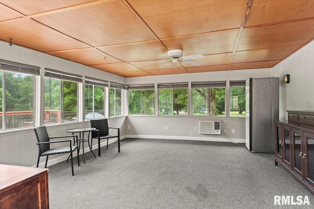 14 Beachview Ln, Springfield, IL 62712 - sunroom / solarium featuring a ceiling fan, a wall mounted air conditioner, carpet floors, and wooden walls