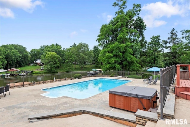 14 Beachview Ln, Springfield, IL 62712 - view of swimming pool featuring a hot tub, a patio area, view of scattered trees, and a water view