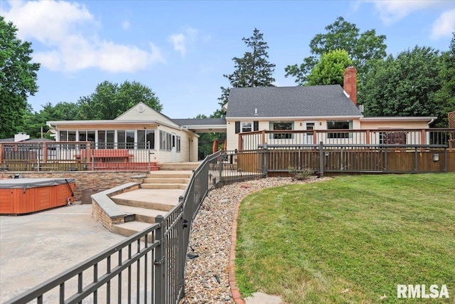 14 Beachview Ln, Springfield, IL 62712 - back of house featuring a hot tub, a patio, a sunroom, a lawn, and a wooden deck