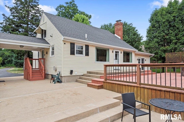 14 Beachview Ln, Springfield, IL 62712 - rear view of house with a chimney, a patio, and a shingled roof