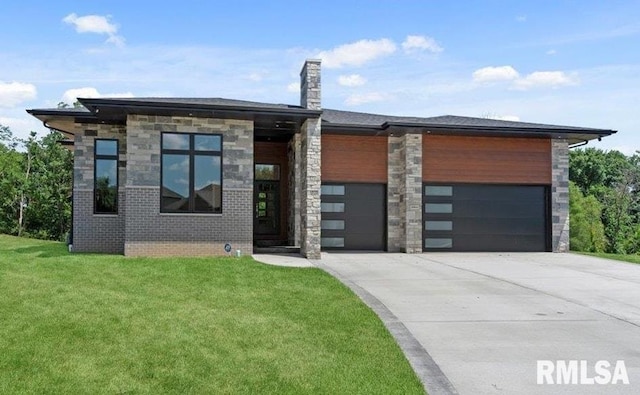 2004 Grants Pond, Chatham, IL 62629 - view of front of home with a garage, concrete driveway, a front lawn, and stone siding