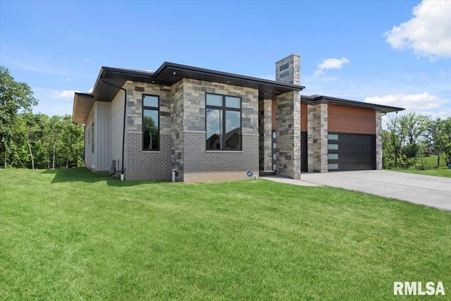 2004 Grants Pond, Chatham, IL 62629 - contemporary house with a garage, concrete driveway, a front yard, and stone siding