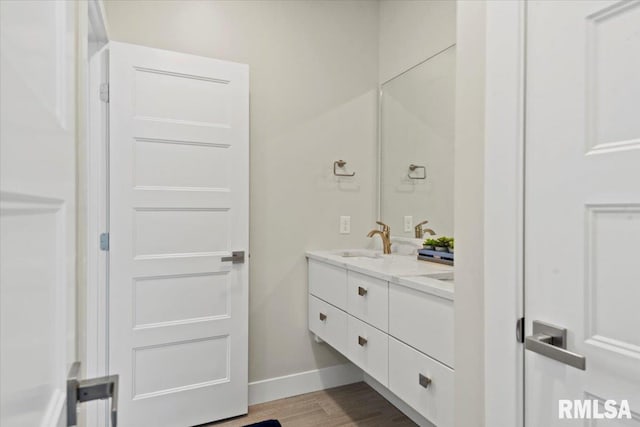 2004 Grants Pond, Chatham, IL 62629 - bathroom with double vanity and wood finished floors