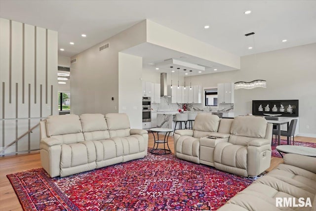 2004 Grants Pond, Chatham, IL 62629 - living room featuring light wood-style flooring and recessed lighting