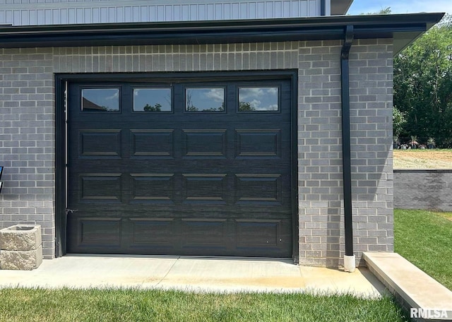 2004 Grants Pond, Chatham, IL 62629 - property entrance with brick siding and a garage