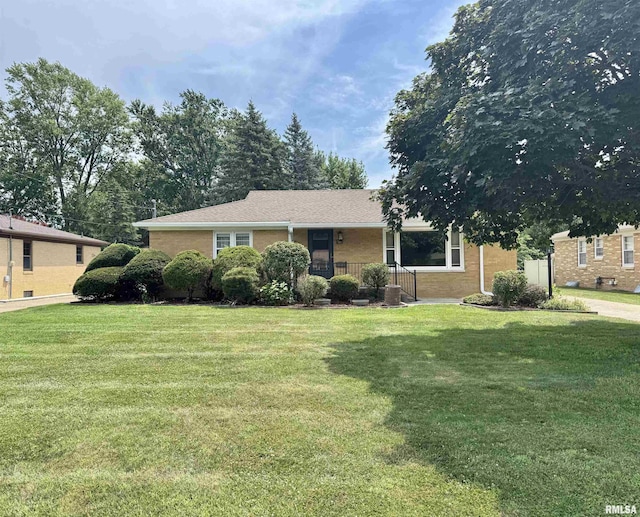 161 Hawkinson Ave, Galesburg, IL 61401 - ranch-style home featuring a front lawn and brick siding